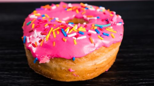 Bright pink home simpson doughnut from the sunshine doughnut company